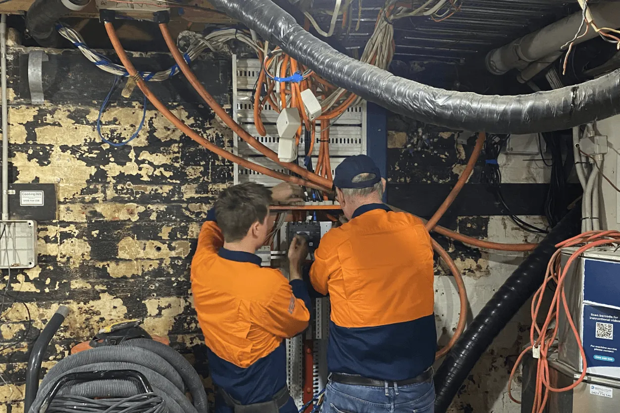 Commercial electrician at work